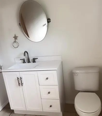 a kitchen with a stove and a microwave