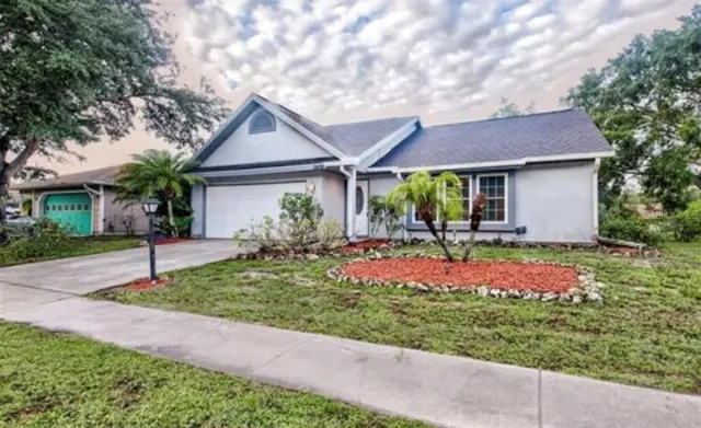 a view of outdoor space with sliding windows