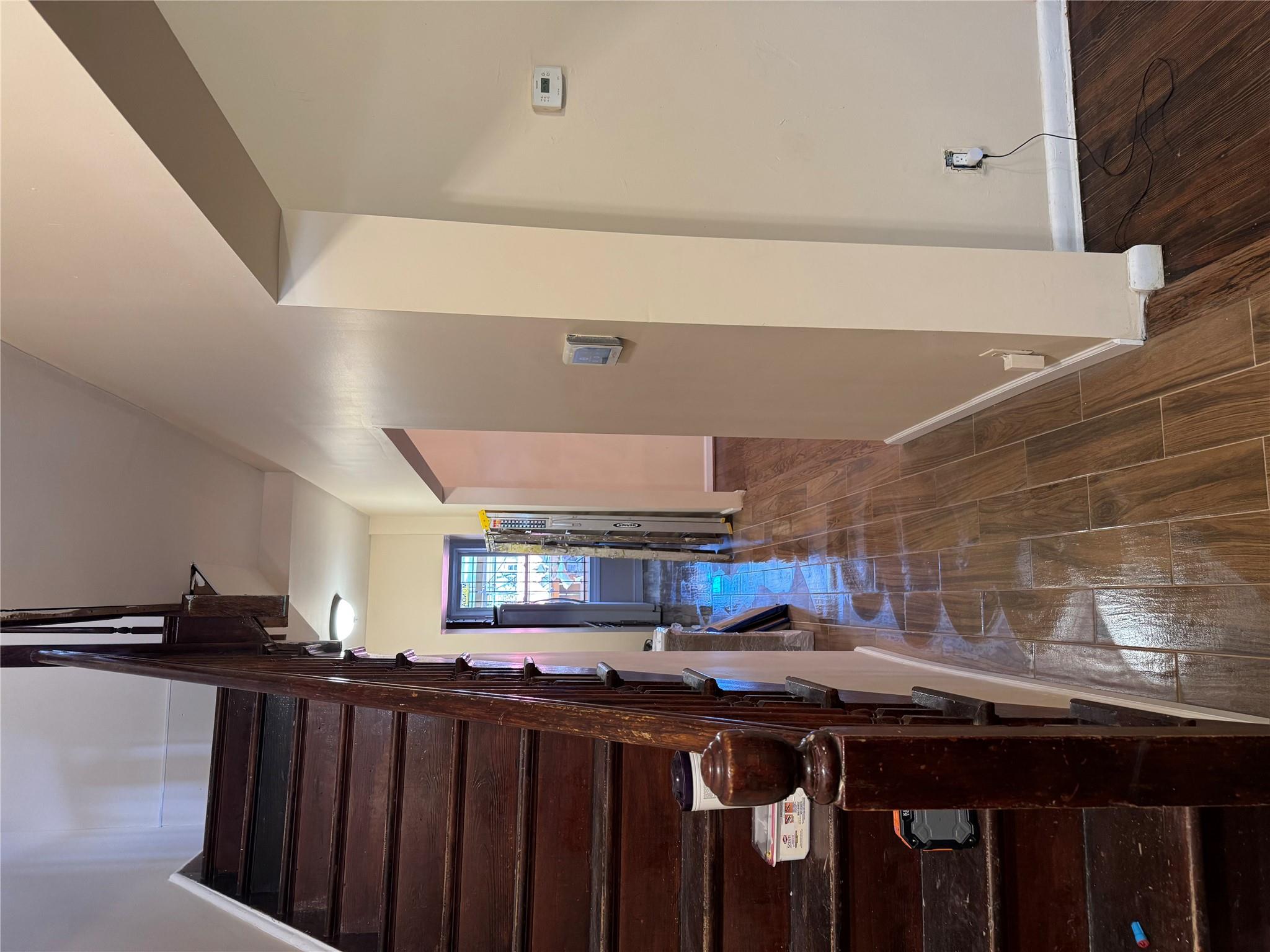 776 Hewitt Place Bronx, NY 10455 - Photo 13 of 20 a view of hallway with wooden floor