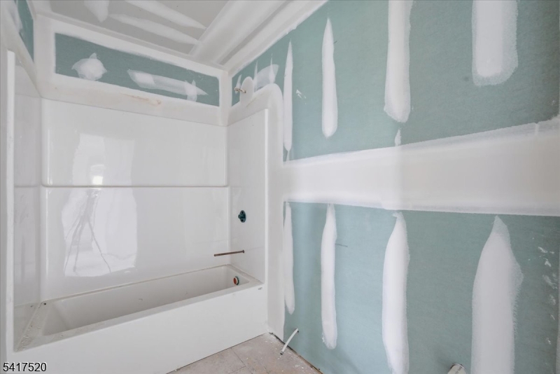 6 Spring Street Phillipsburg, NJ 08865 - Photo 29 of 31 a bathroom with a bathtub