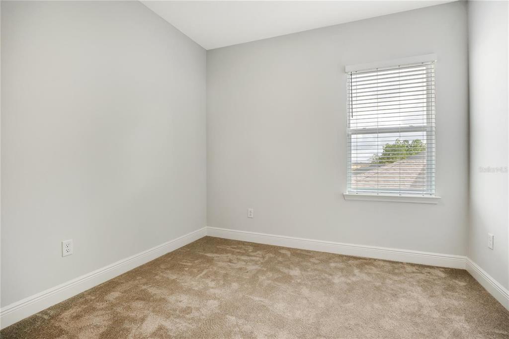 6547 Rover Way St. Cloud, FL 34771 - Photo 8 of 11 an empty room with a window