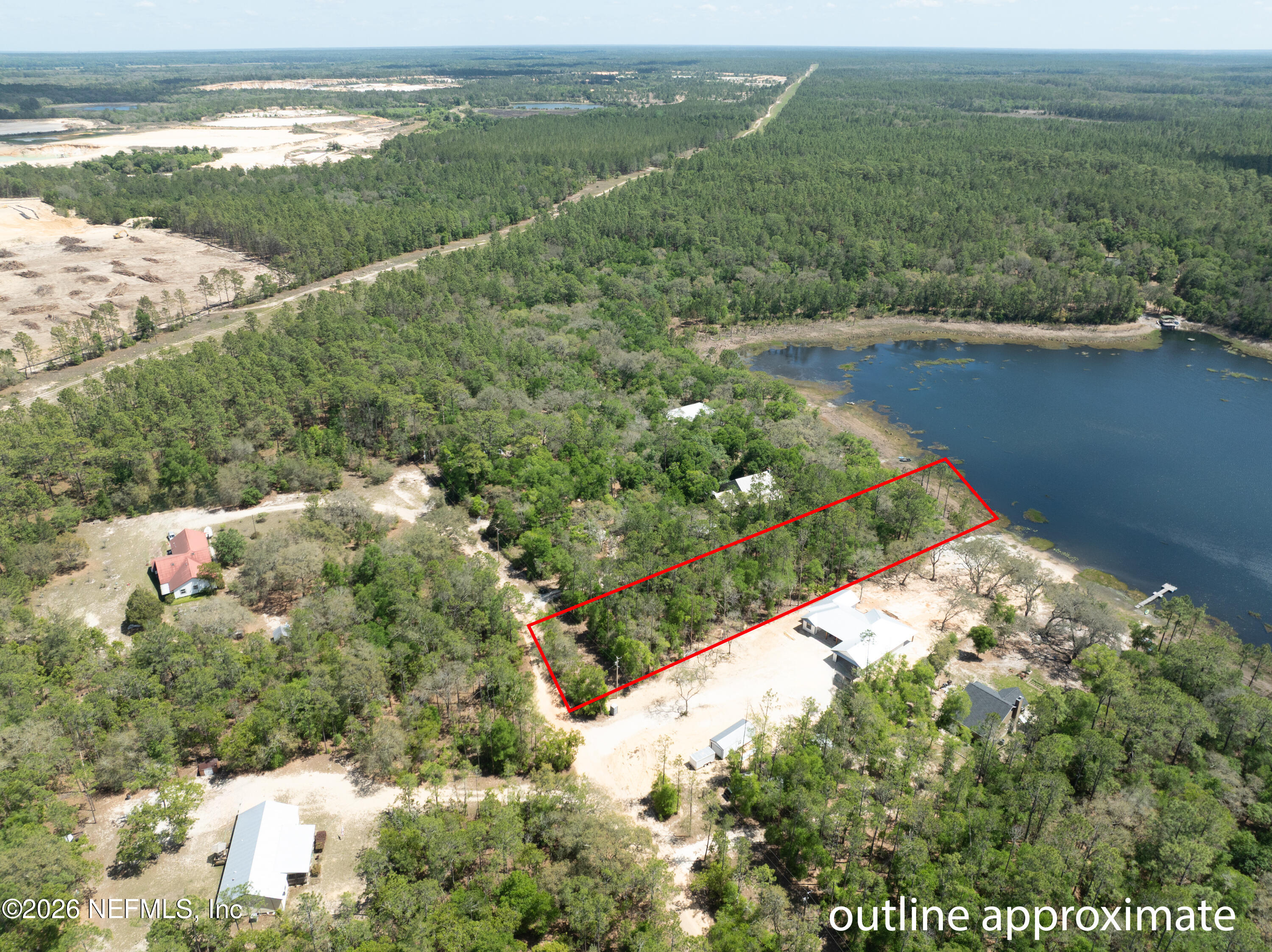 111 Gator Trail Melrose, FL 32666 - Photo 11 of 11 a view of a lake with a mountain