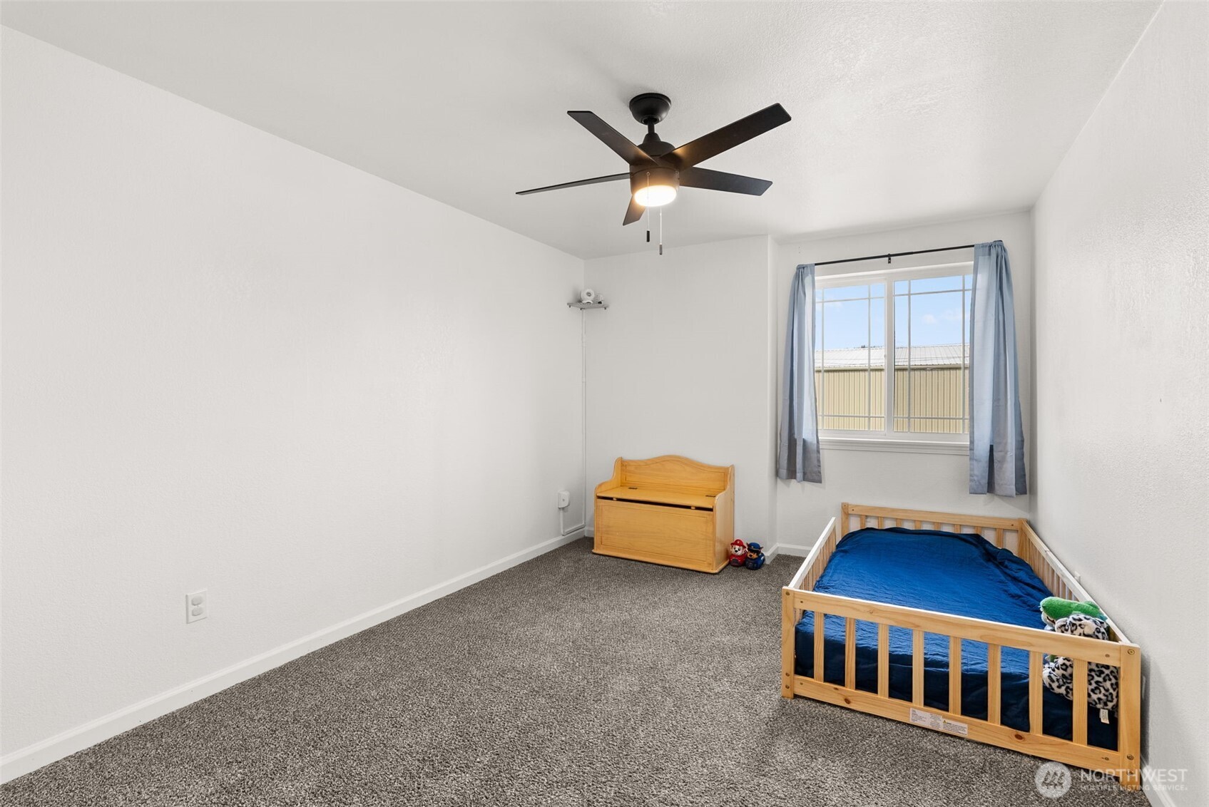 1231 Southwest Elzina Street Chehalis, WA 98532 - Photo 19 of 24 a room with furniture and windows