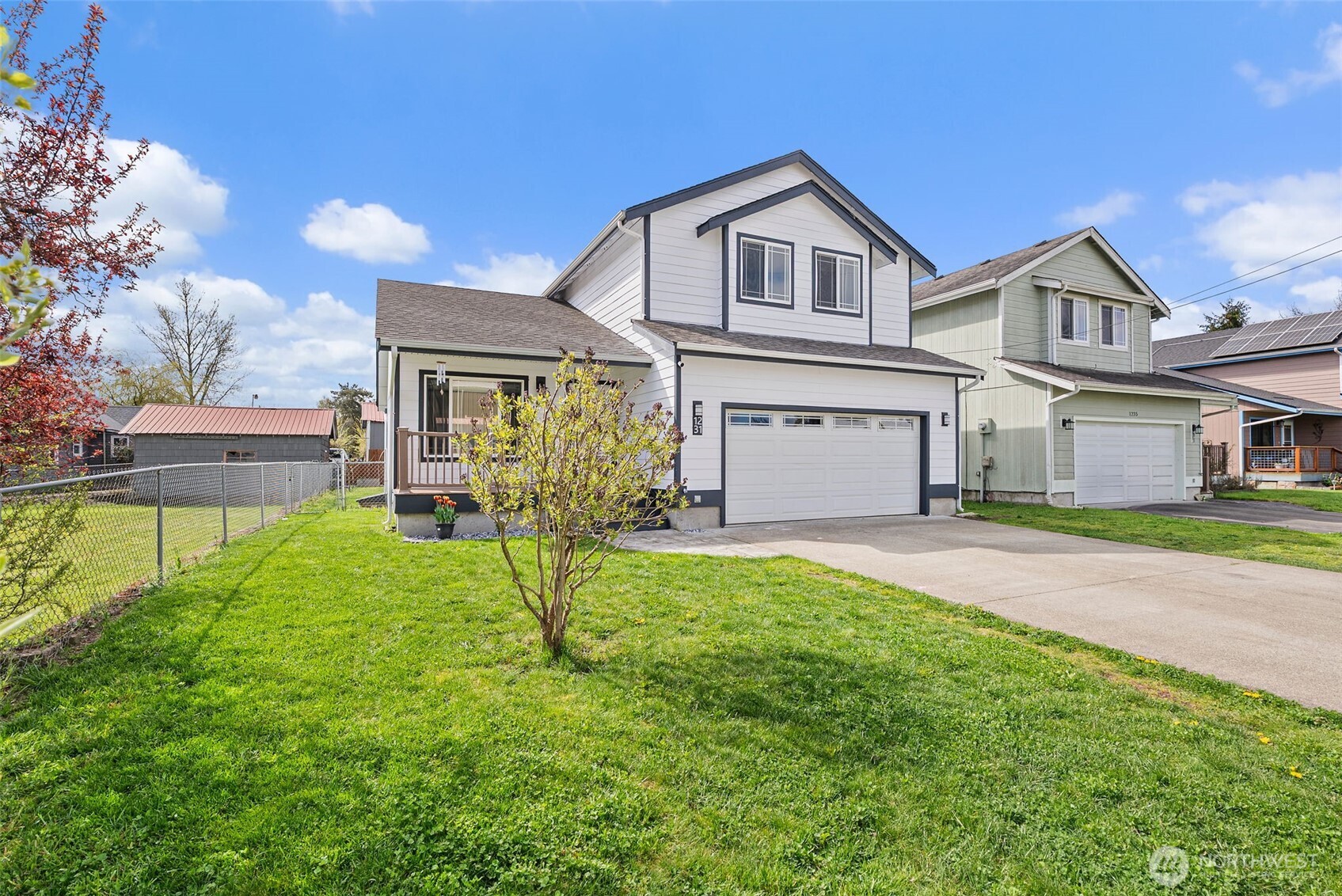 1231 Southwest Elzina Street Chehalis, WA 98532 - Photo 3 of 24 a view of house with a yard