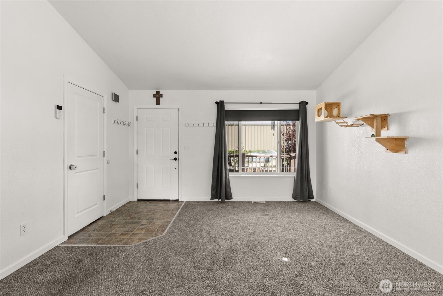 1231 Southwest Elzina Street Chehalis, WA 98532 - Photo 6 of 24 a view of an empty room with a window