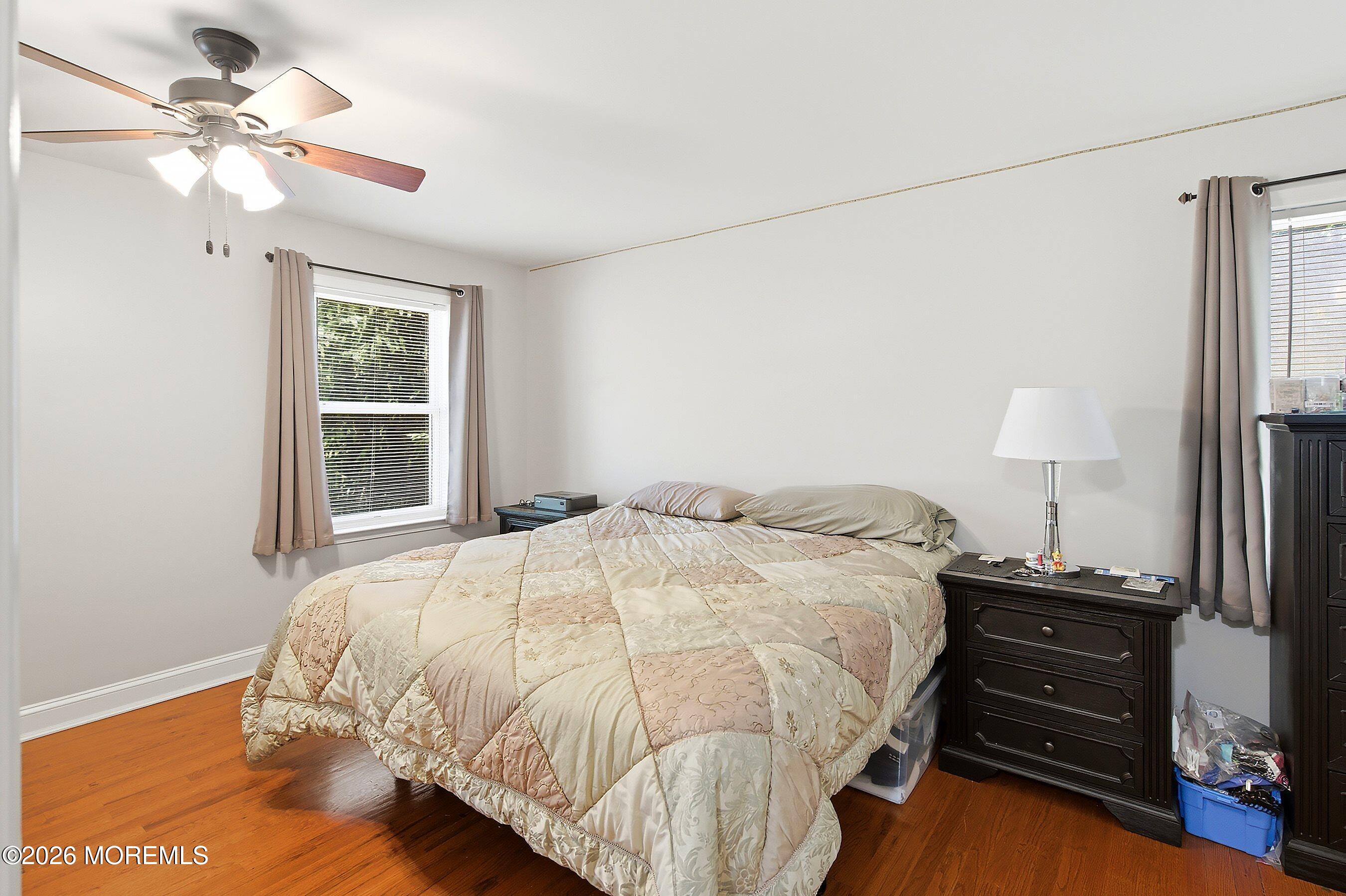 935 Bethel Church Road Jackson, NJ 08527 - Photo 13 of 32 a bedroom with a bed and a window