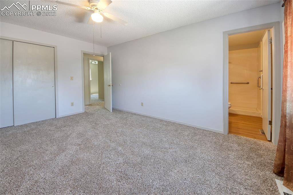541 Blossom Field Road Fountain, CO 80817 - Photo 13 of 30 an empty room with a bathroom