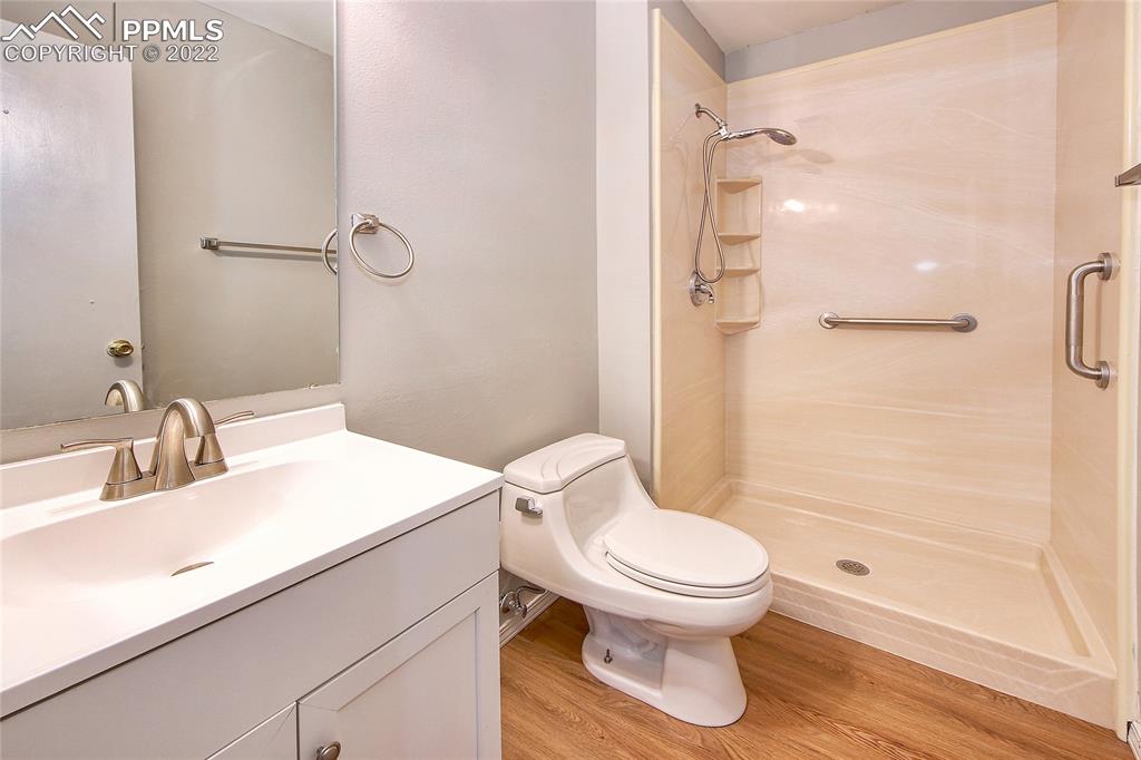 541 Blossom Field Road Fountain, CO 80817 - Photo 15 of 30 a bathroom with a sink toilet and shower