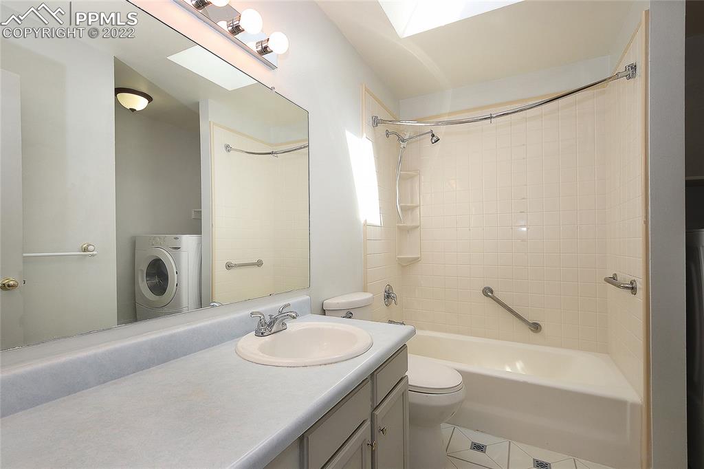 541 Blossom Field Road Fountain, CO 80817 - Photo 20 of 30 a bathroom with a sink a toilet and shower