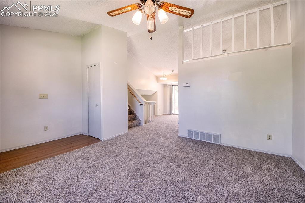 541 Blossom Field Road Fountain, CO 80817 - Photo 3 of 30 a view of a livingroom with an empty space
