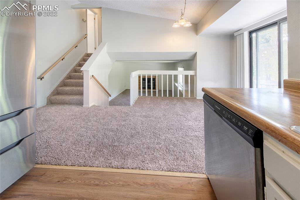 541 Blossom Field Road Fountain, CO 80817 - Photo 8 of 30 a view of a livingroom with furniture and staircase