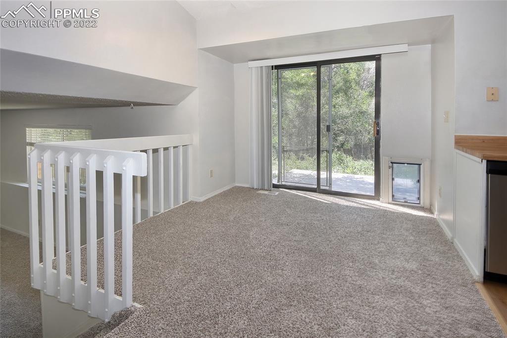 541 Blossom Field Road Fountain, CO 80817 - Photo 9 of 30 a view of a room with stairs