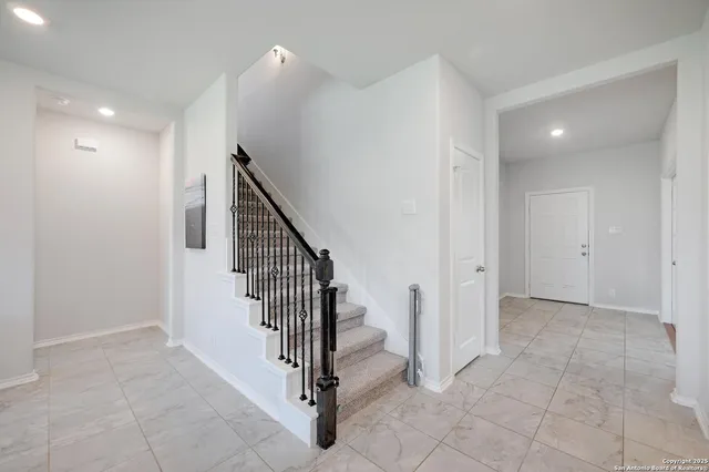 a view of a hallway with entryway
