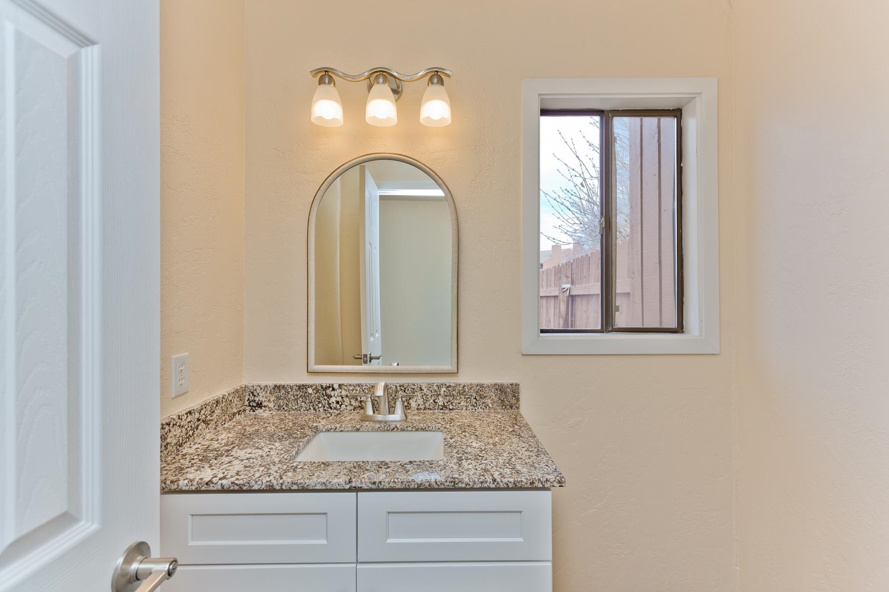 575-28 28 1/2 Road, Unit 44 Grand Junction, CO 81501 - Photo 27 of 39 a bathroom with a granite countertop sink and a mirror