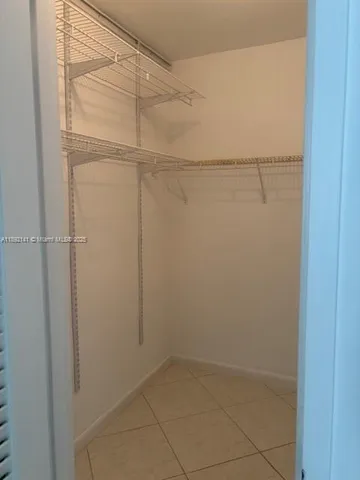 a view of a lobby with furniture and floor to ceiling window