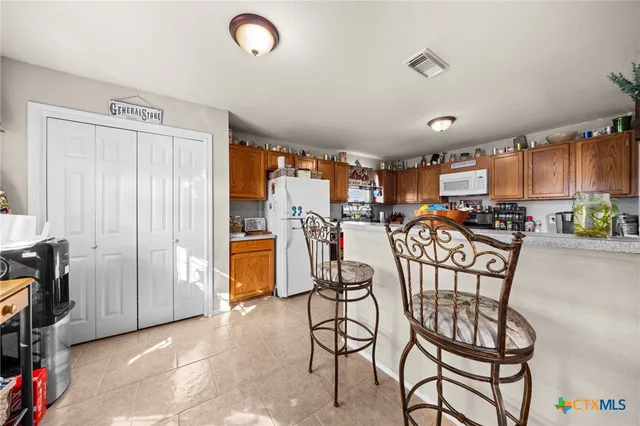 a view of hallway with washer and dryer