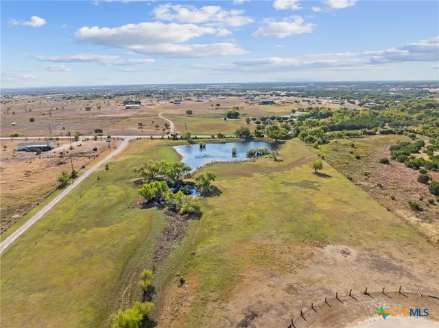 a view of a lake with a city