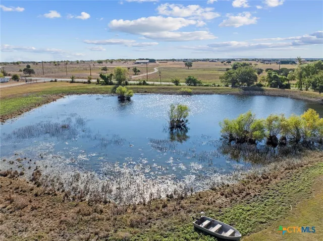 a view of a lake with a city