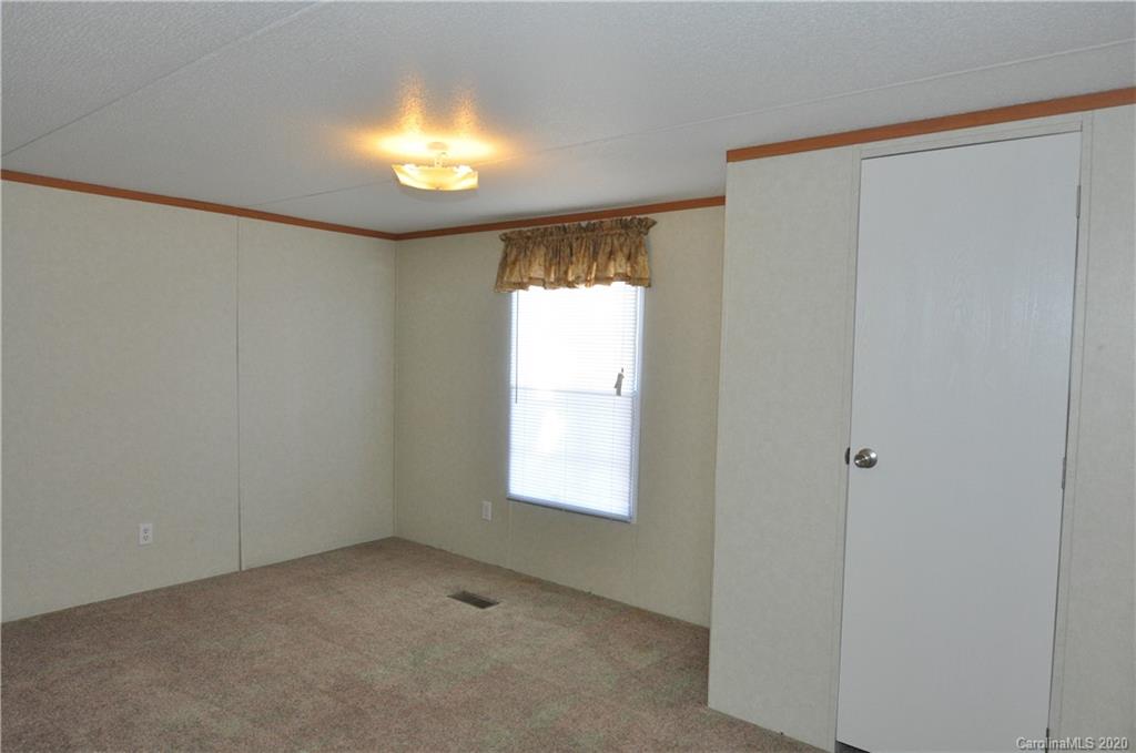 1585 Ashford Road, Unit 2B Chester, SC 29706 - Photo 4 of 15 a view of an empty room with a window