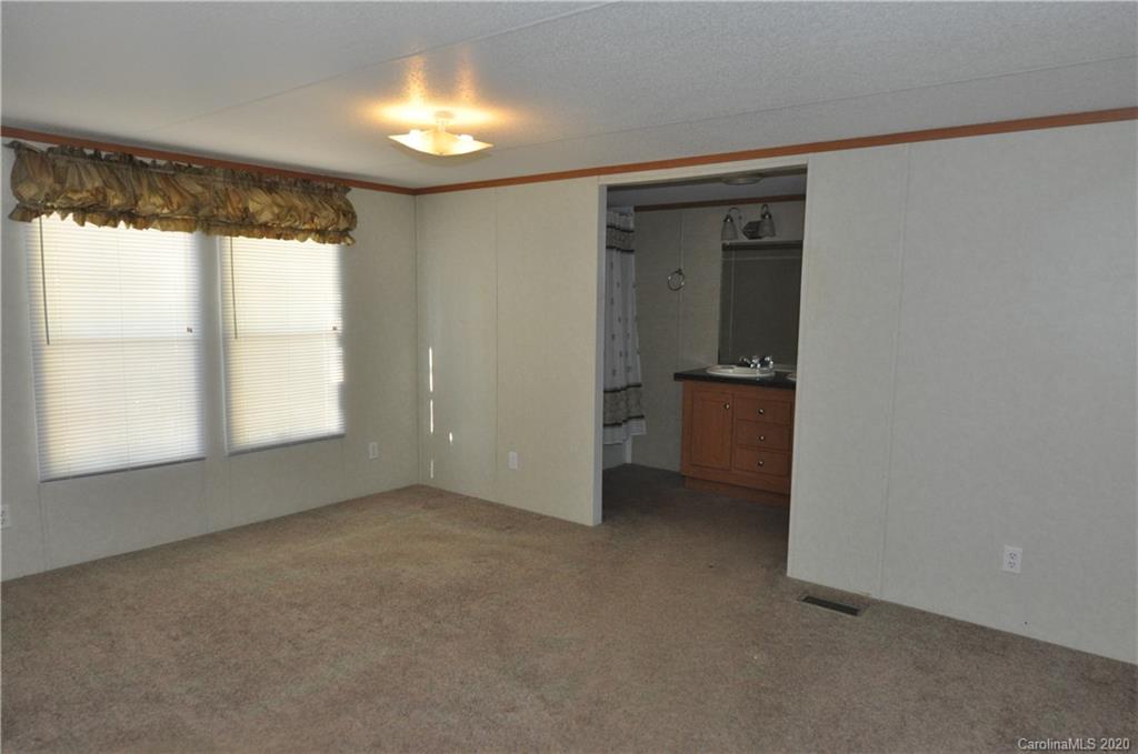 1585 Ashford Road, Unit 2B Chester, SC 29706 - Photo 5 of 15 a view of an empty room with a window