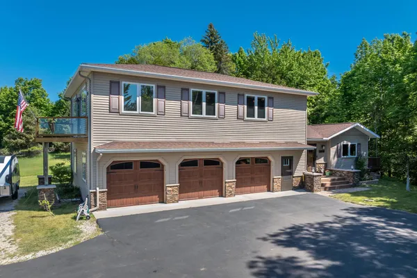 $575,000 | 11446 Barnes Road, Kewadin, MI 49648