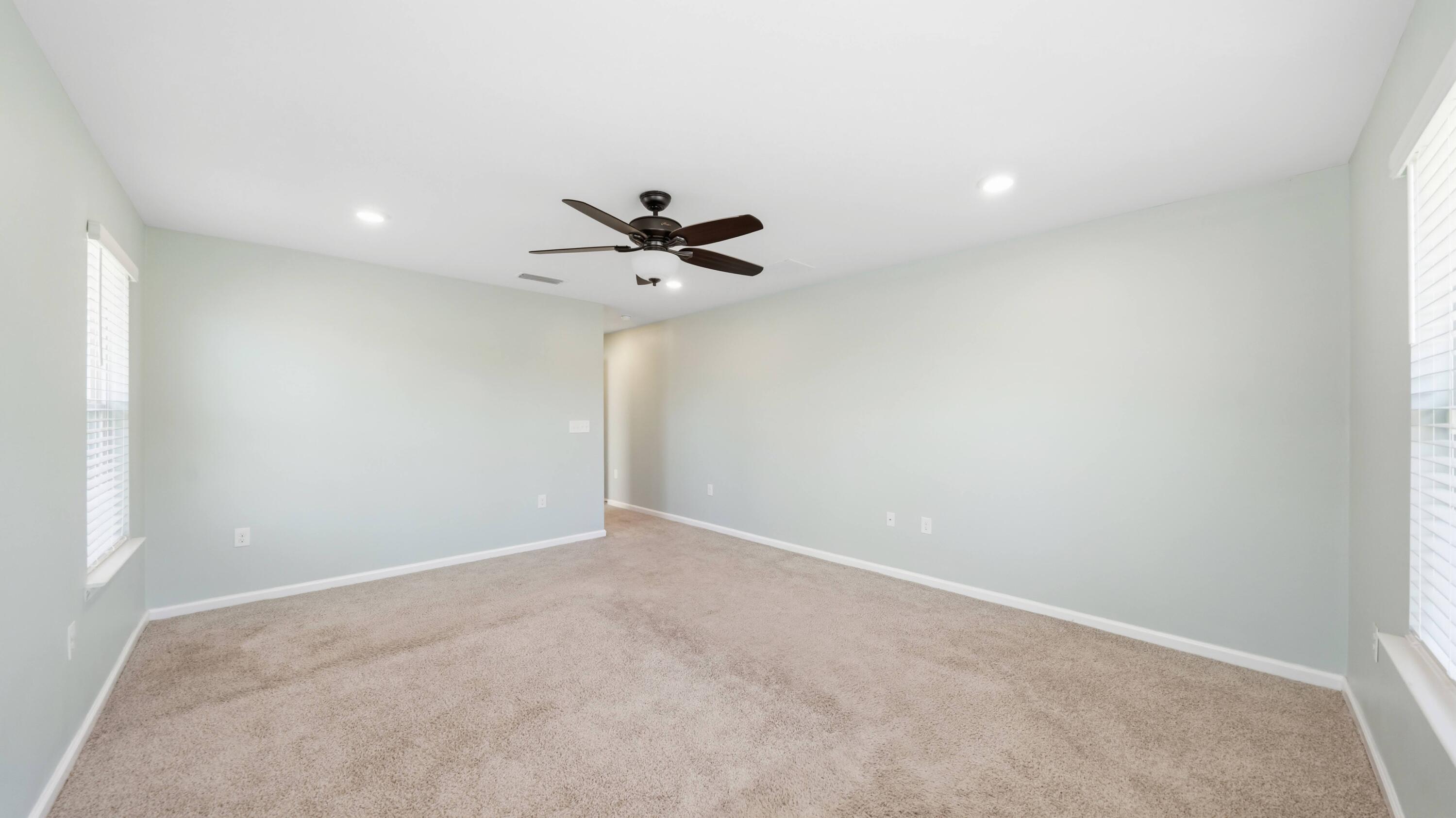 3927 Alva Thomas Road Panama City, FL 32404 - Photo 13 of 46 a view of a room with a fan and a window