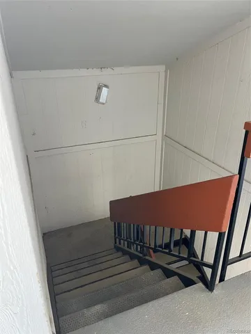 a view of a room with stairs