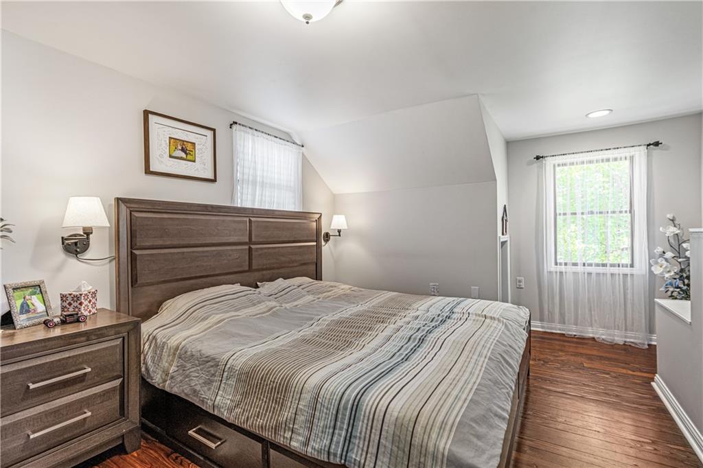 2332 Highway 168 Georgetown, PA 15043 - Photo 13 of 33 a bedroom with a bed and wooden floor