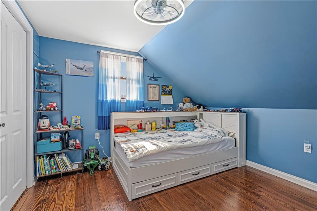 2332 Highway 168 Georgetown, PA 15043 - Photo 15 of 33 a bed room with a bed and a book shelf