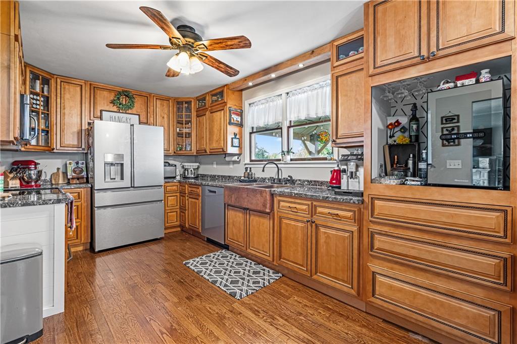 2332 Highway 168 Georgetown, PA 15043 - Photo 6 of 33 a kitchen with granite countertop stainless steel appliances a sink and counter space