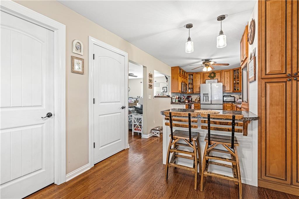 2332 Highway 168 Georgetown, PA 15043 - Photo 8 of 33 a view of a dining room with furniture window and wooden floor