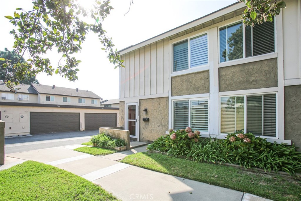 11058 Grant Way Stanton, CA 90680 - Photo 2 of 40 a front view of a house with garden