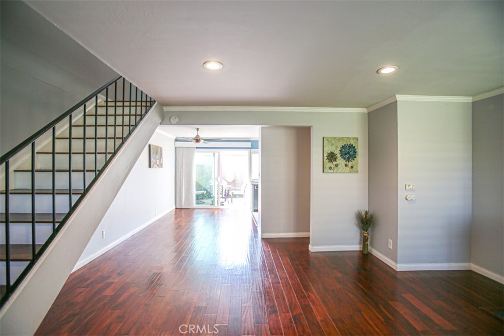 11058 Grant Way Stanton, CA 90680 - Photo 4 of 40 a view of an entryway with wooden floor