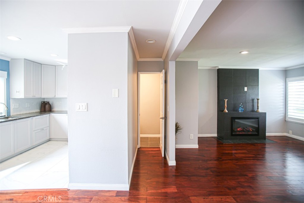 11058 Grant Way Stanton, CA 90680 - Photo 9 of 40 a view of empty room with wooden floor