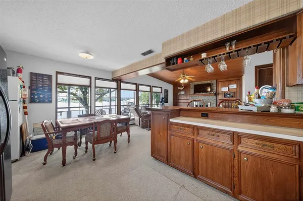 a kitchen that has a sink and a stove