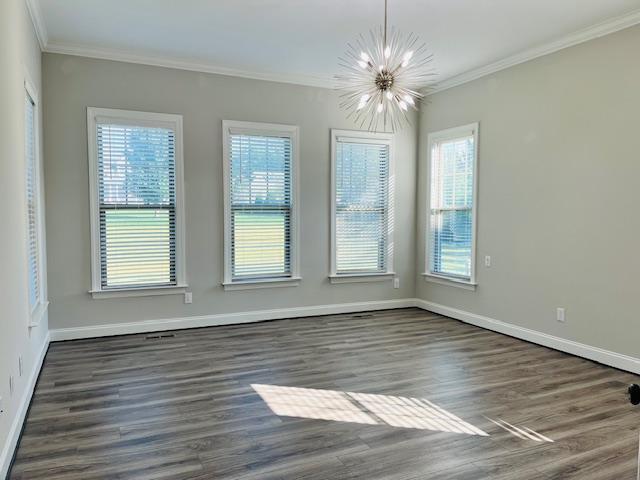 1717 Banks View Drive Raleigh, NC 27603 - Photo 5 of 33 a view of an empty room with wooden floor and a window
