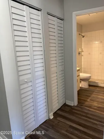 a view of a room that has a bench in it