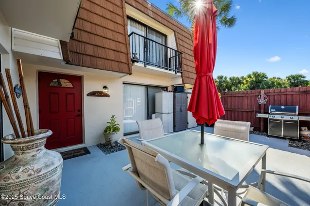 a kitchen with stainless steel appliances granite countertop a refrigerator and a stove