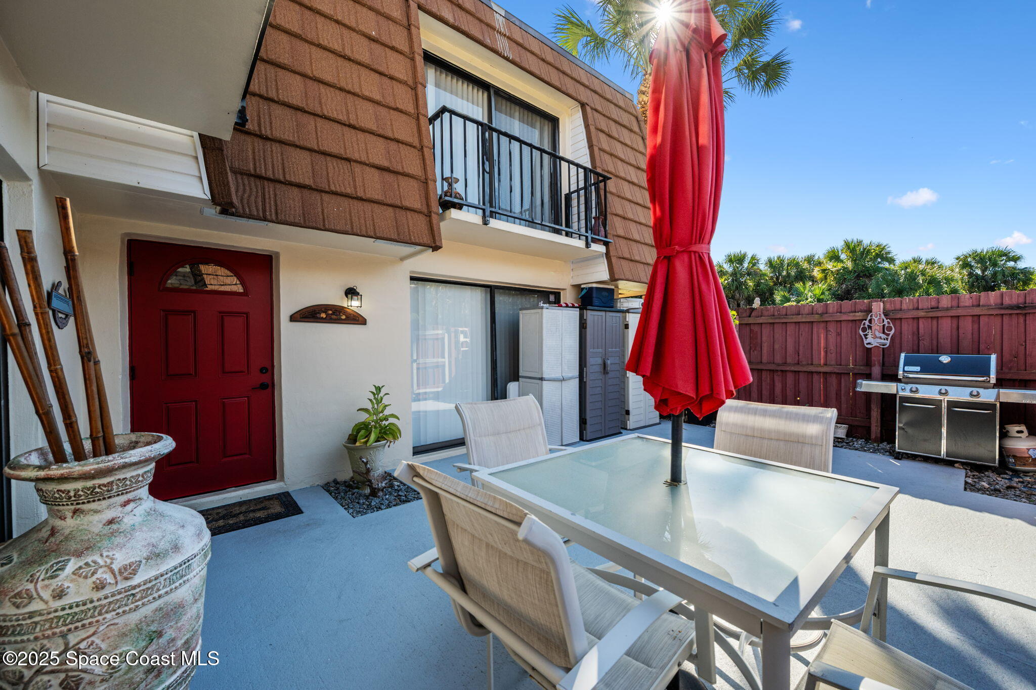 1511 Joshua Drive Northeast Palm Bay, FL 32905 - Photo 16 of 27 a living room with furniture a table and chair