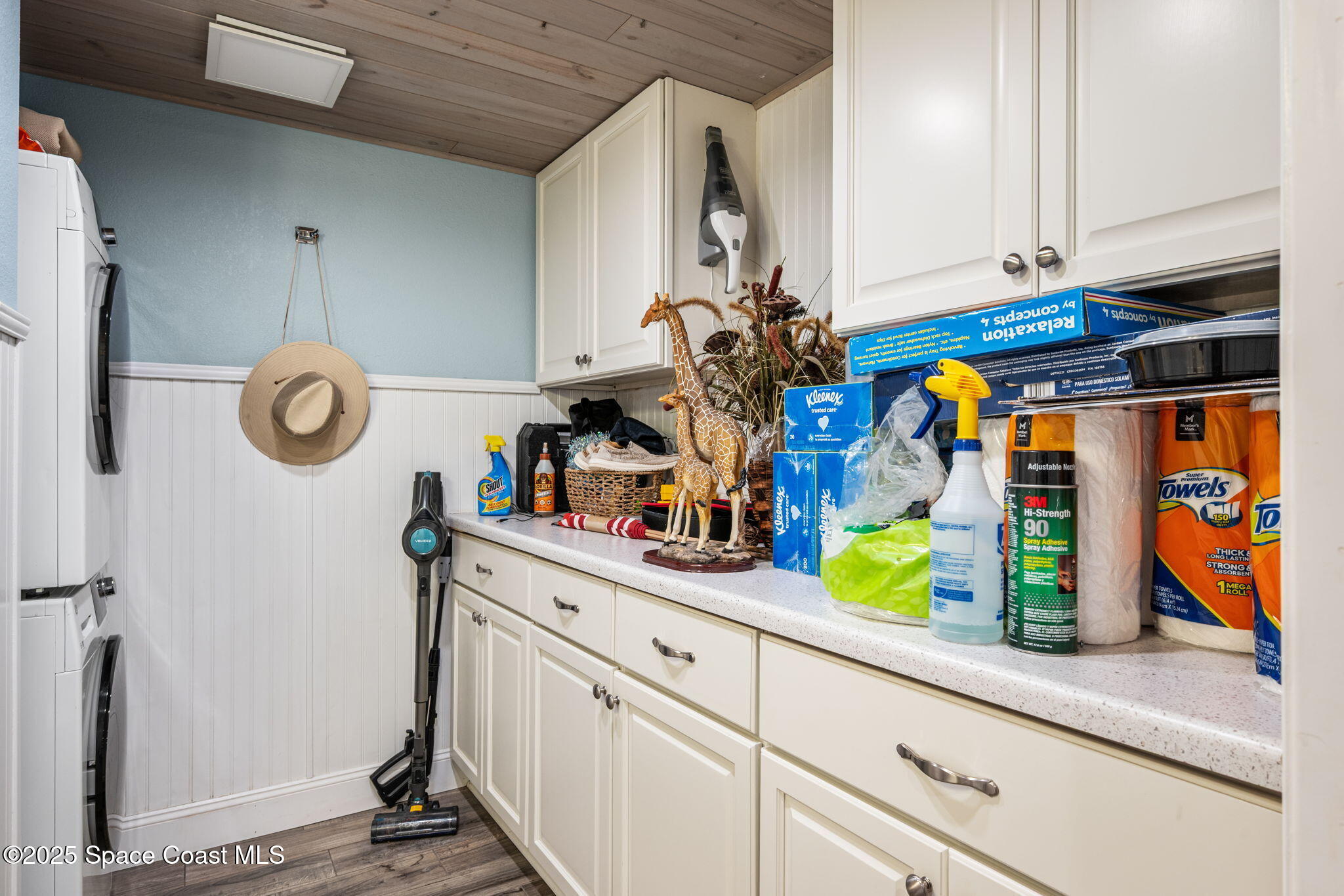 1511 Joshua Drive Northeast Palm Bay, FL 32905 - Photo 17 of 27 a kitchen with stainless steel appliances granite countertop a refrigerator and a stove