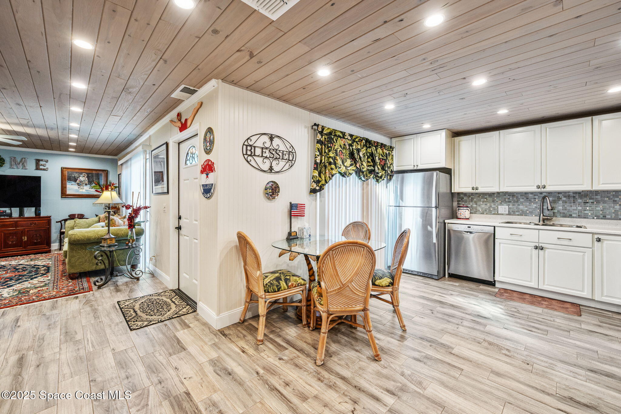 1511 Joshua Drive Northeast Palm Bay, FL 32905 - Photo 9 of 27 Family/Living Space & Kitchen Area