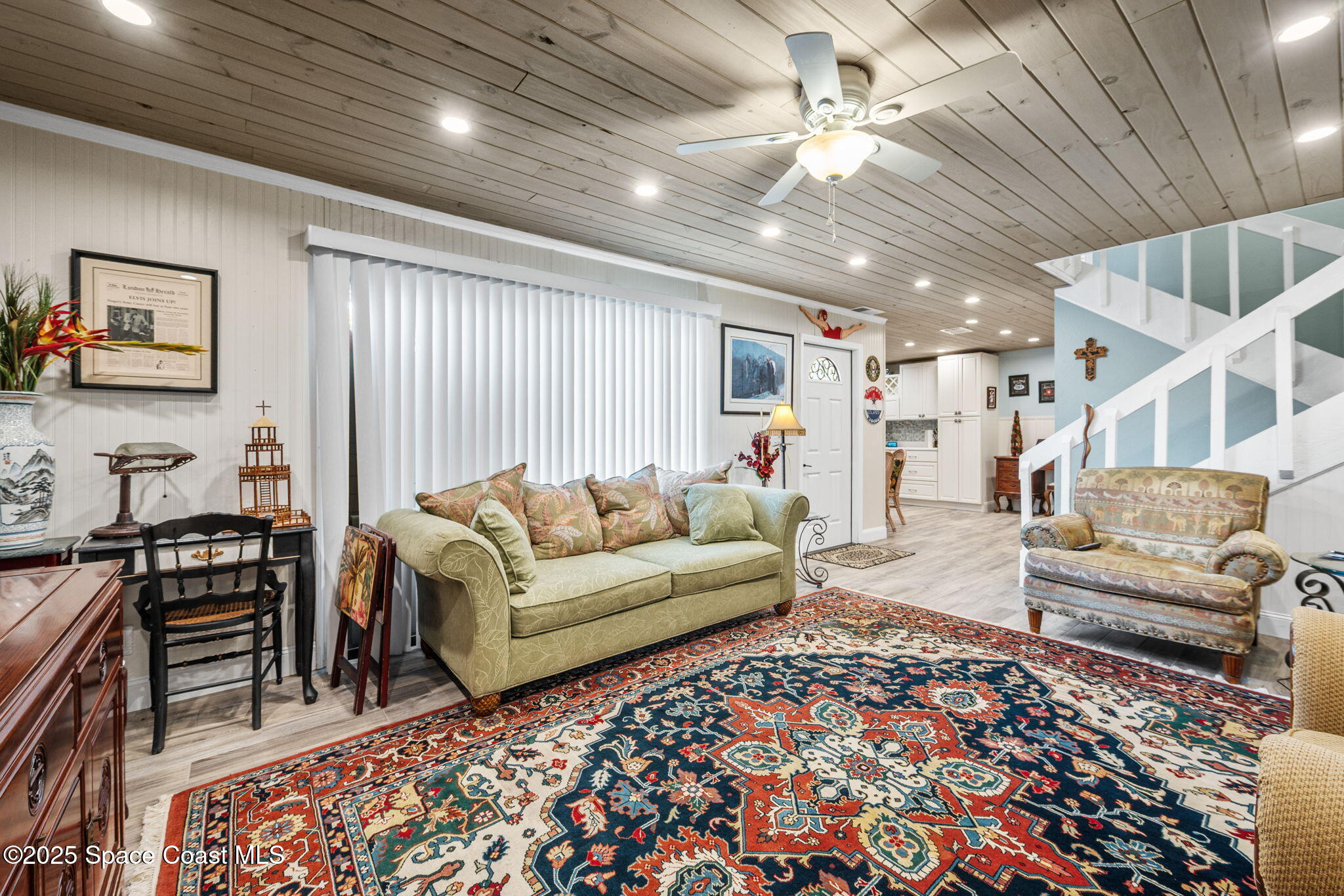 1511 Joshua Drive Northeast Palm Bay, FL 32905 - Photo 10 of 27 a living room with furniture and a rug