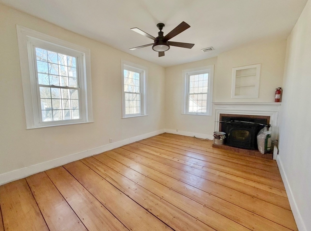 278 East Main Street Plainfield, MA 01070 - Photo 17 of 33 a view of empty room with wooden floor and fan