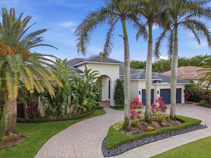an aerial view of a house with a garden