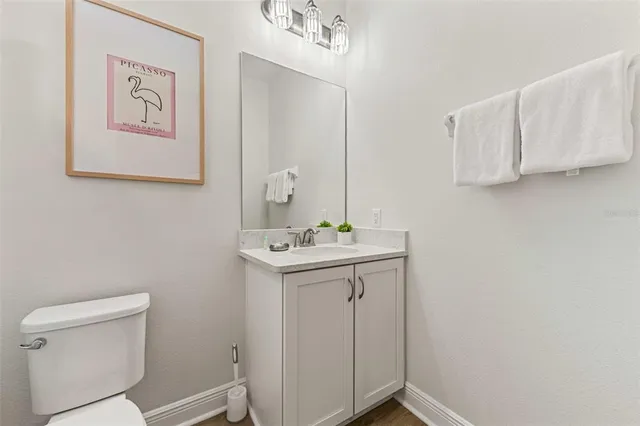 a bedroom with a bed and a television