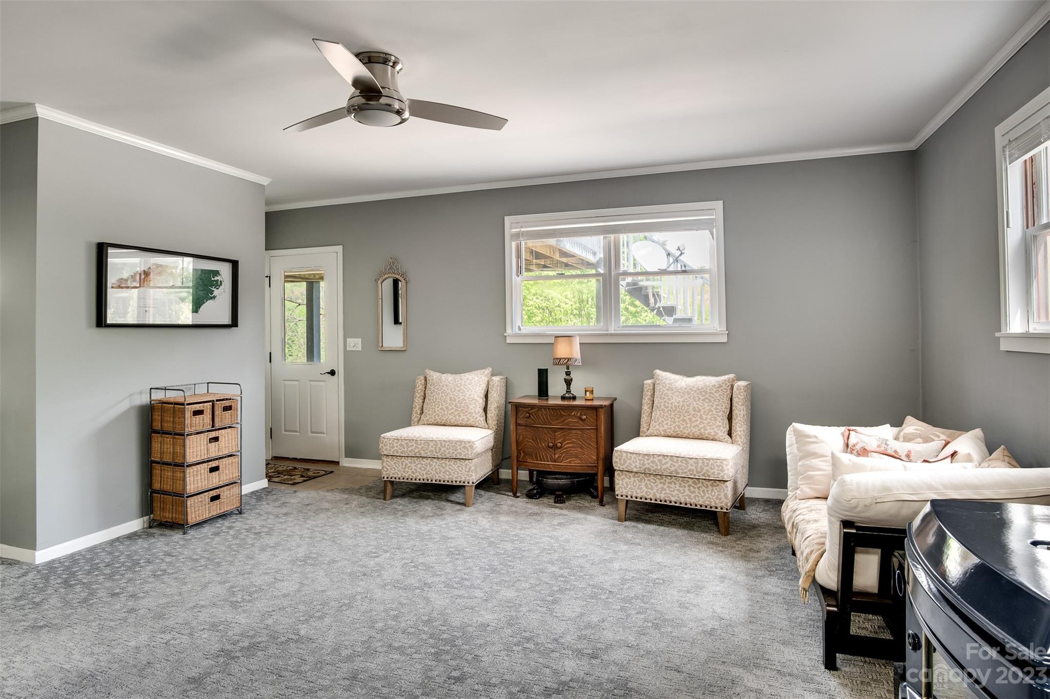 209 Emerald Hill Road Franklin, NC 28734 - Photo 17 of 33 a living room with furniture and a window