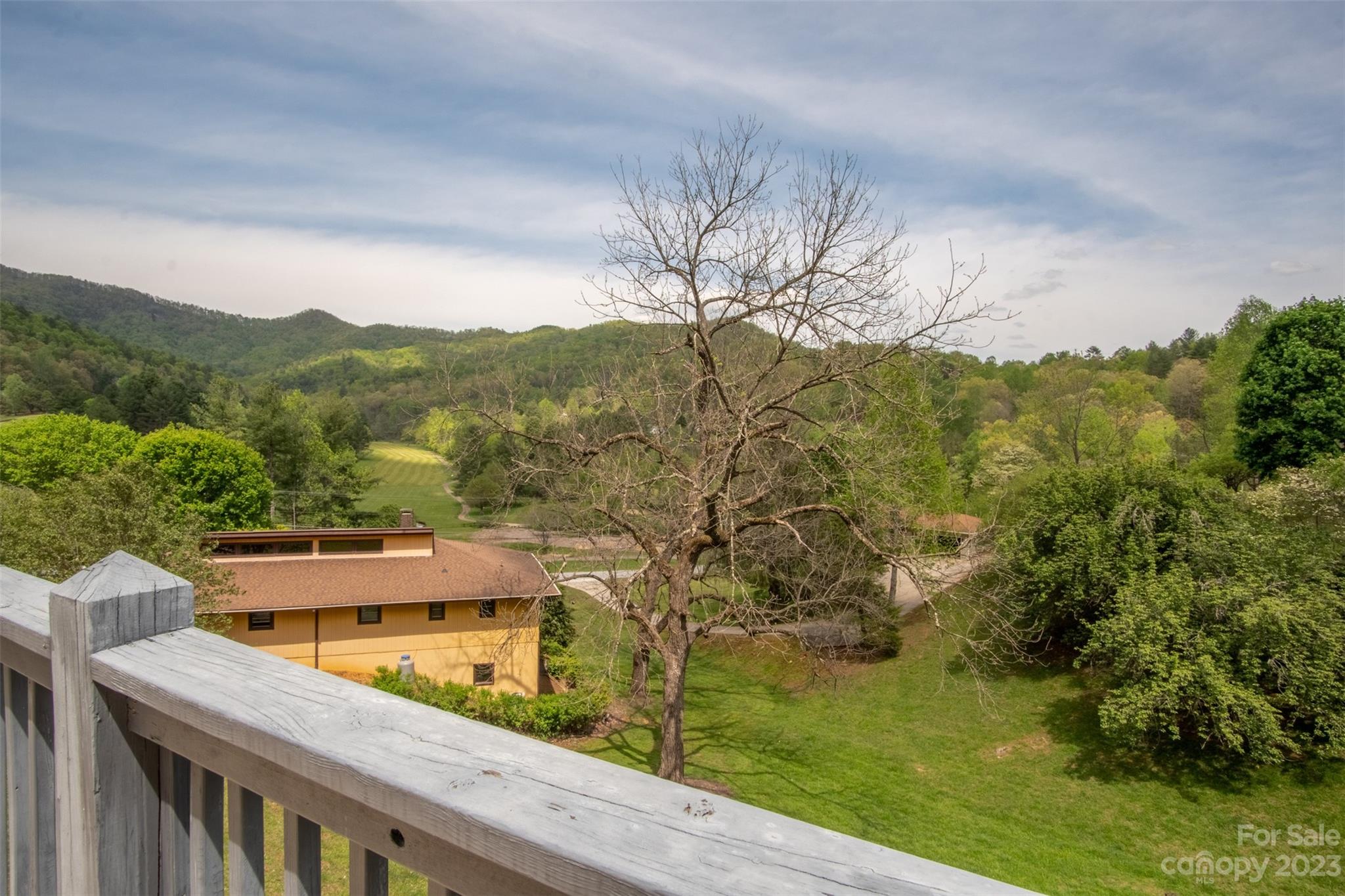 209 Emerald Hill Road Franklin, NC 28734 - Photo 24 of 33 a view of a lake from a balcony