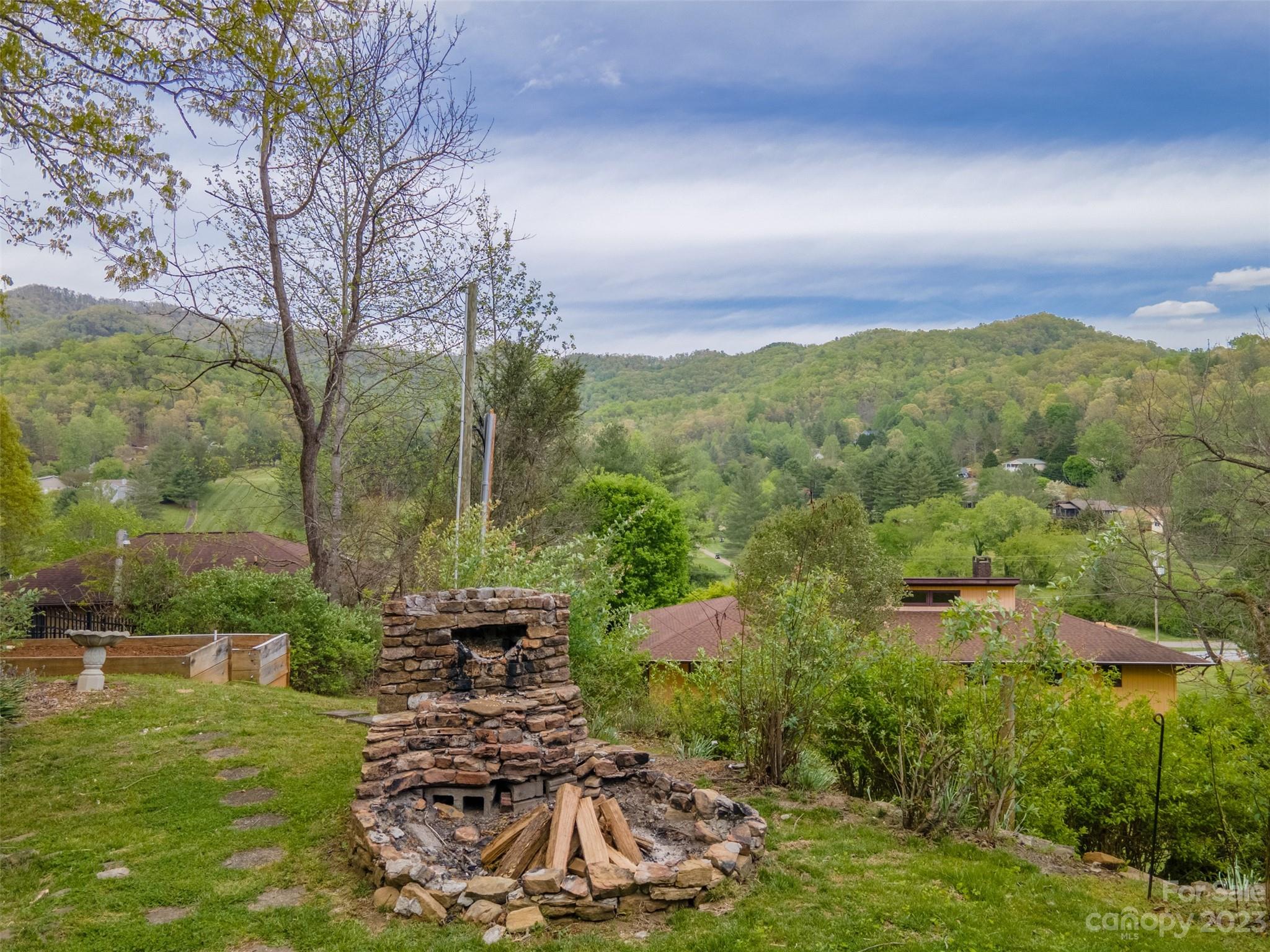 209 Emerald Hill Road Franklin, NC 28734 - Photo 28 of 33 a view of a garden with an ocean