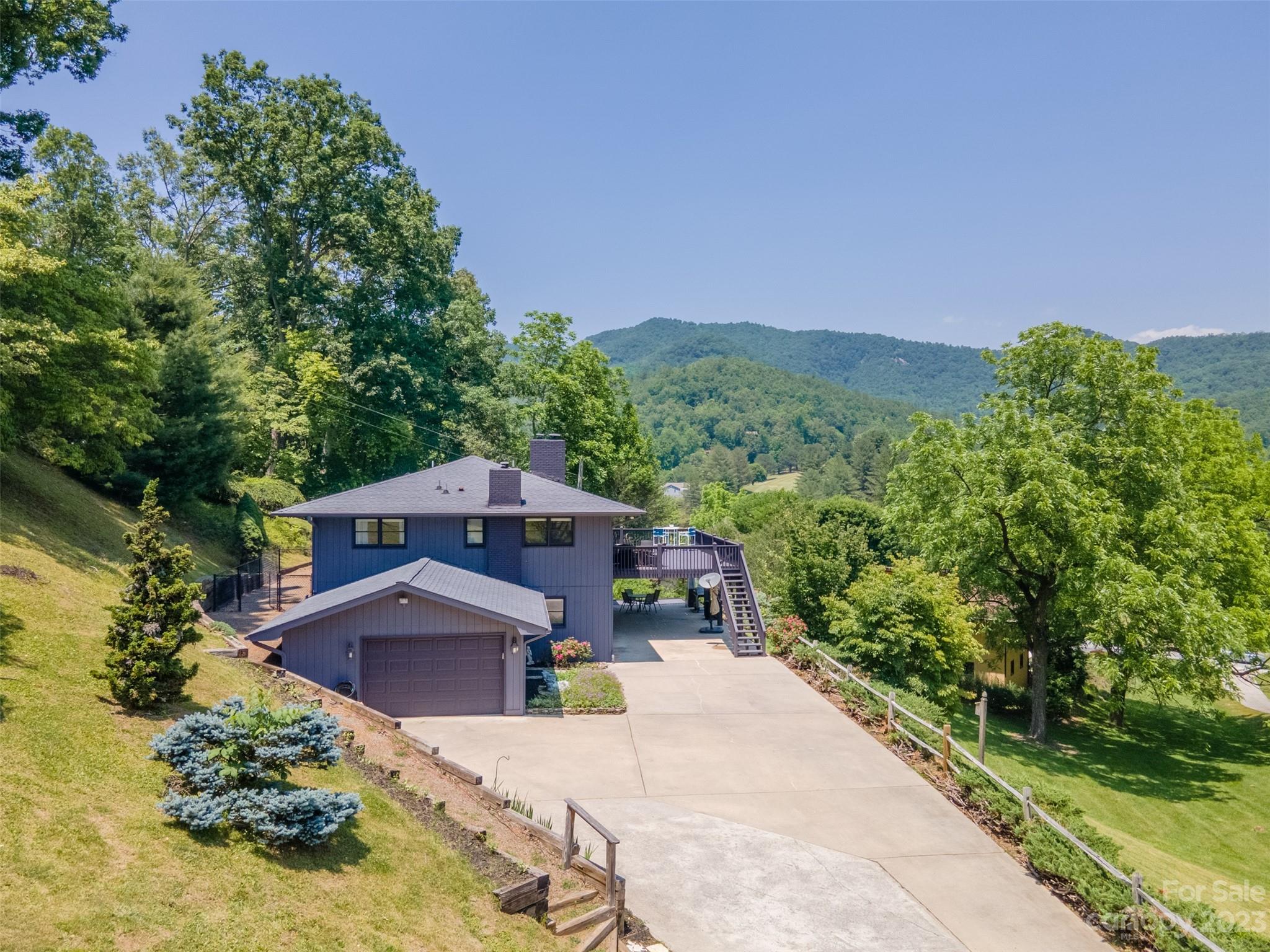 209 Emerald Hill Road Franklin, NC 28734 - Photo 31 of 33 an aerial view of a house with a yard