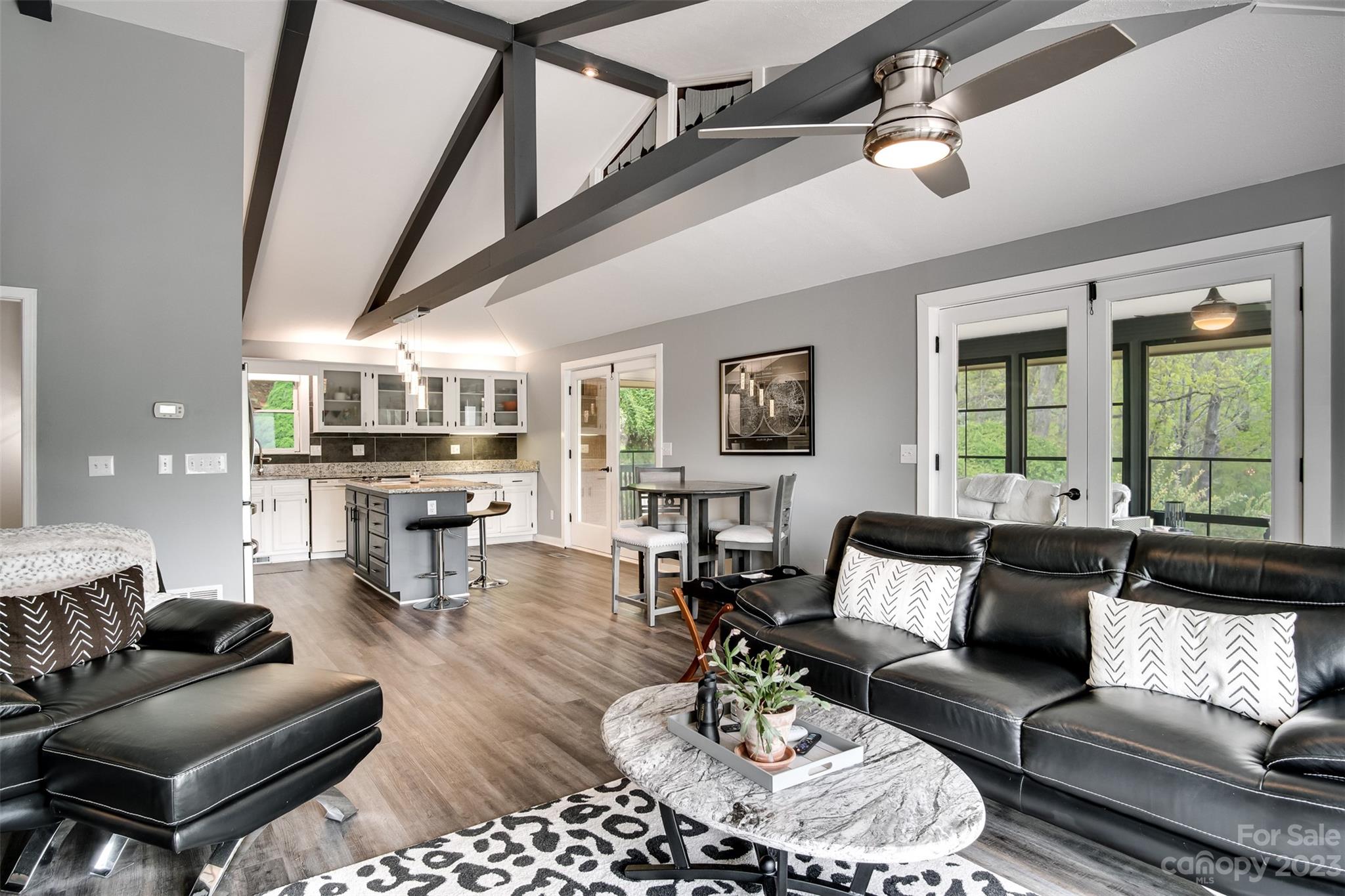 209 Emerald Hill Road Franklin, NC 28734 - Photo 5 of 33 a living room with furniture and a large window
